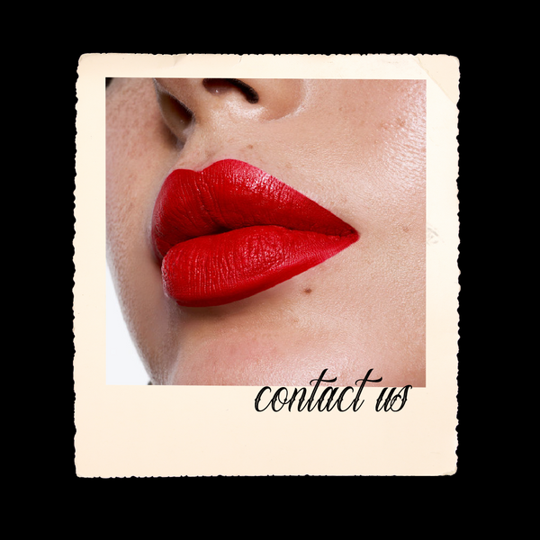 Close-up of red lipstick on lips with 'contact us' text